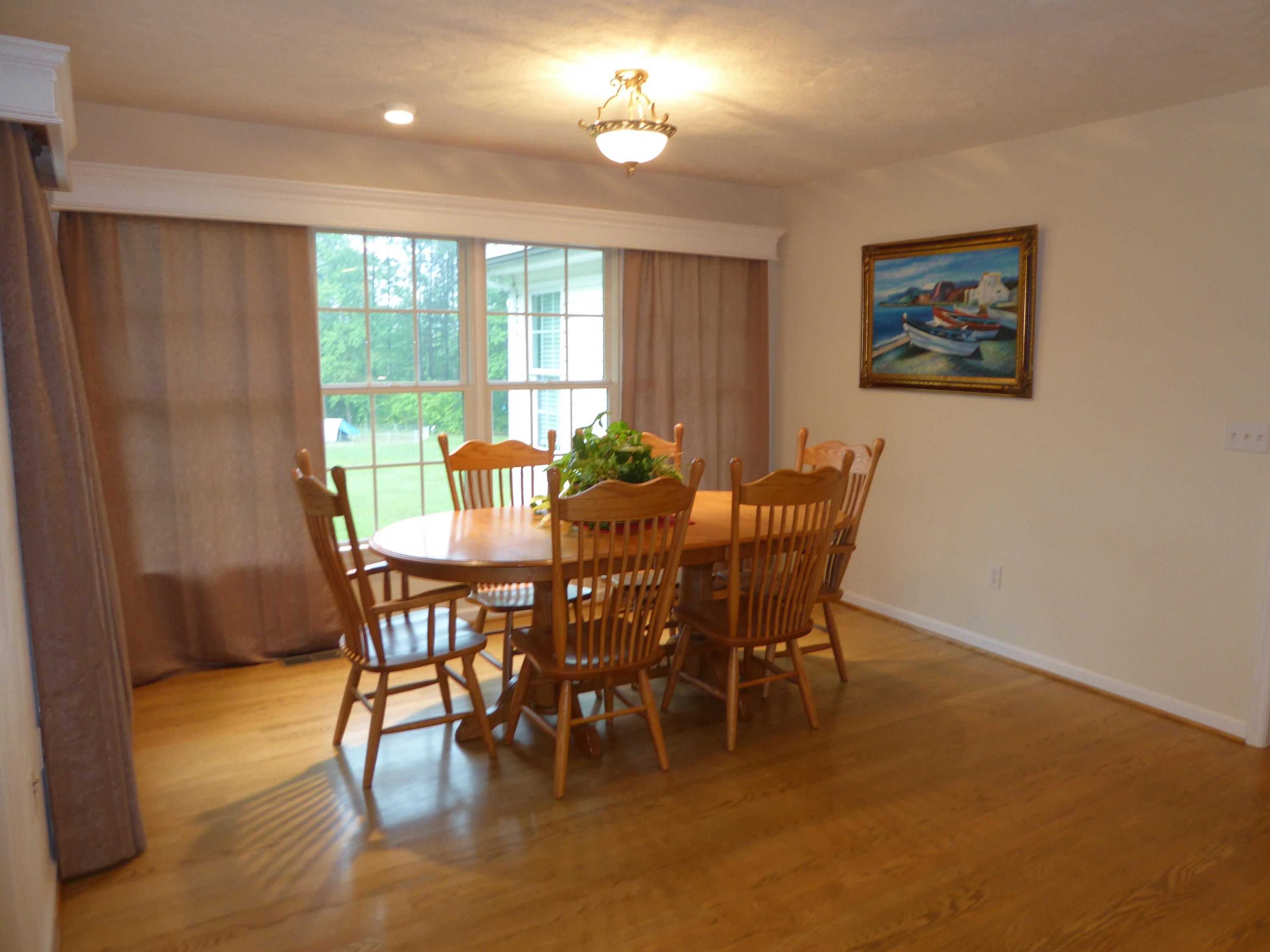 7740 Edwardsville Road Hardy, VA 24101 - Photo 12 of 92 a view of a dining room with furniture window and outside view