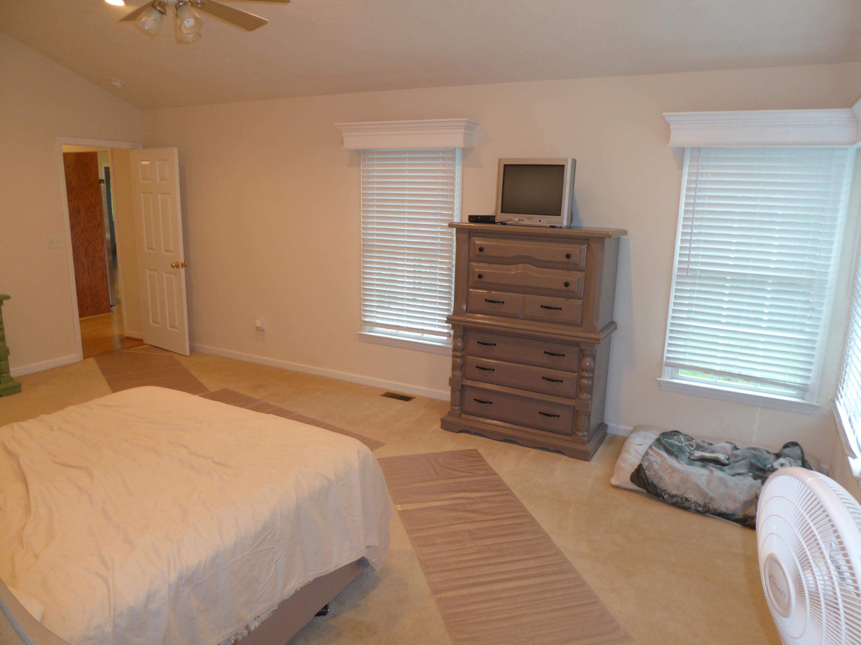 7740 Edwardsville Road Hardy, VA 24101 - Photo 16 of 92 a bedroom with a bed and furniture