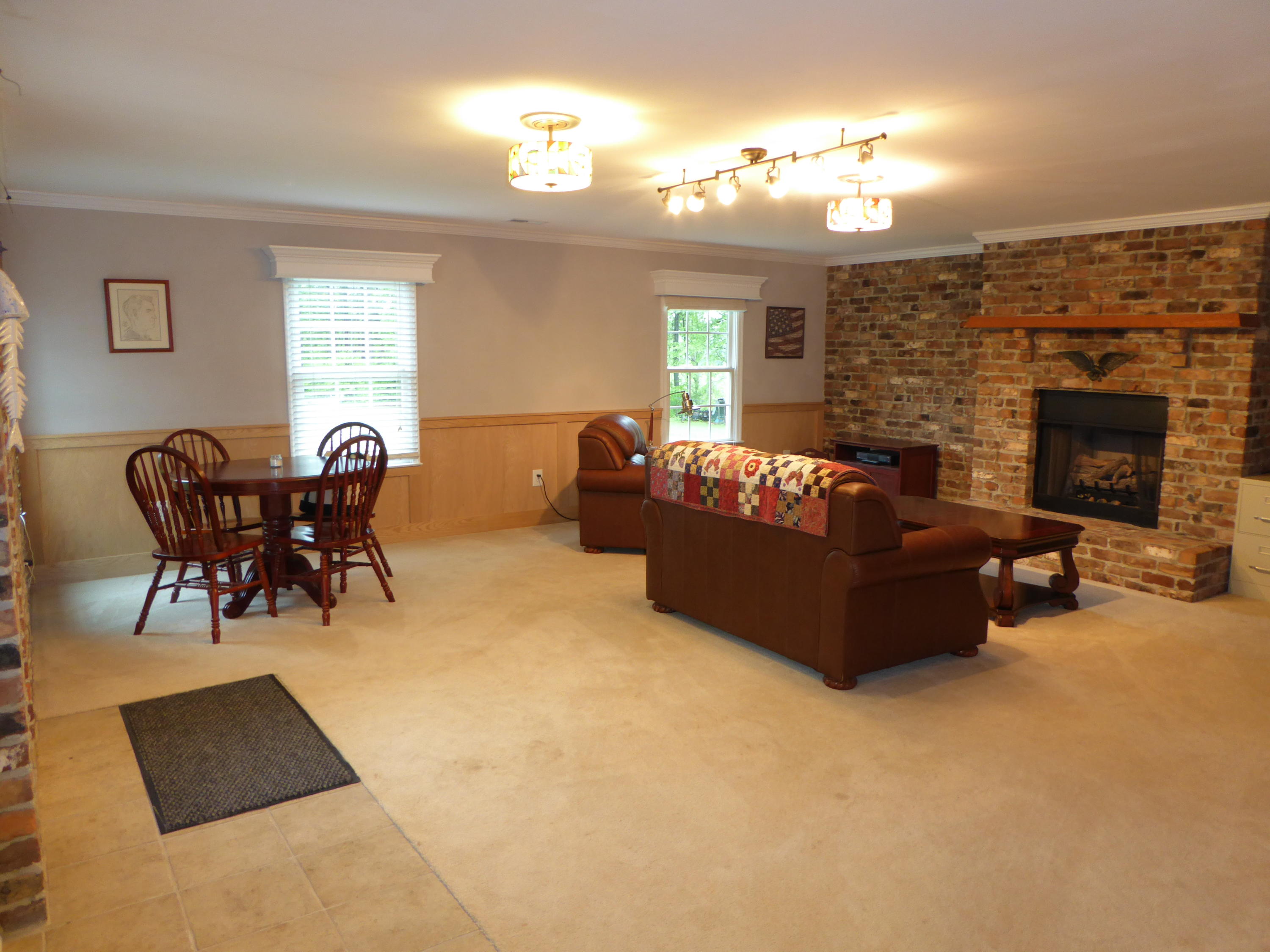 7740 Edwardsville Road Hardy, VA 24101 - Photo 24 of 92 a living room with furniture and a fireplace