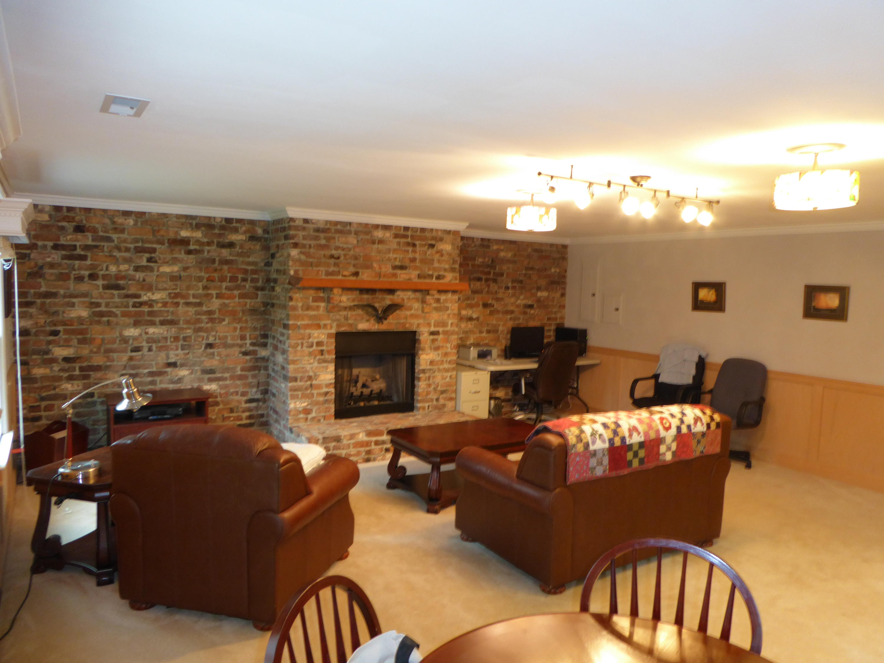 7740 Edwardsville Road Hardy, VA 24101 - Photo 25 of 92 a living room with furniture and a fireplace