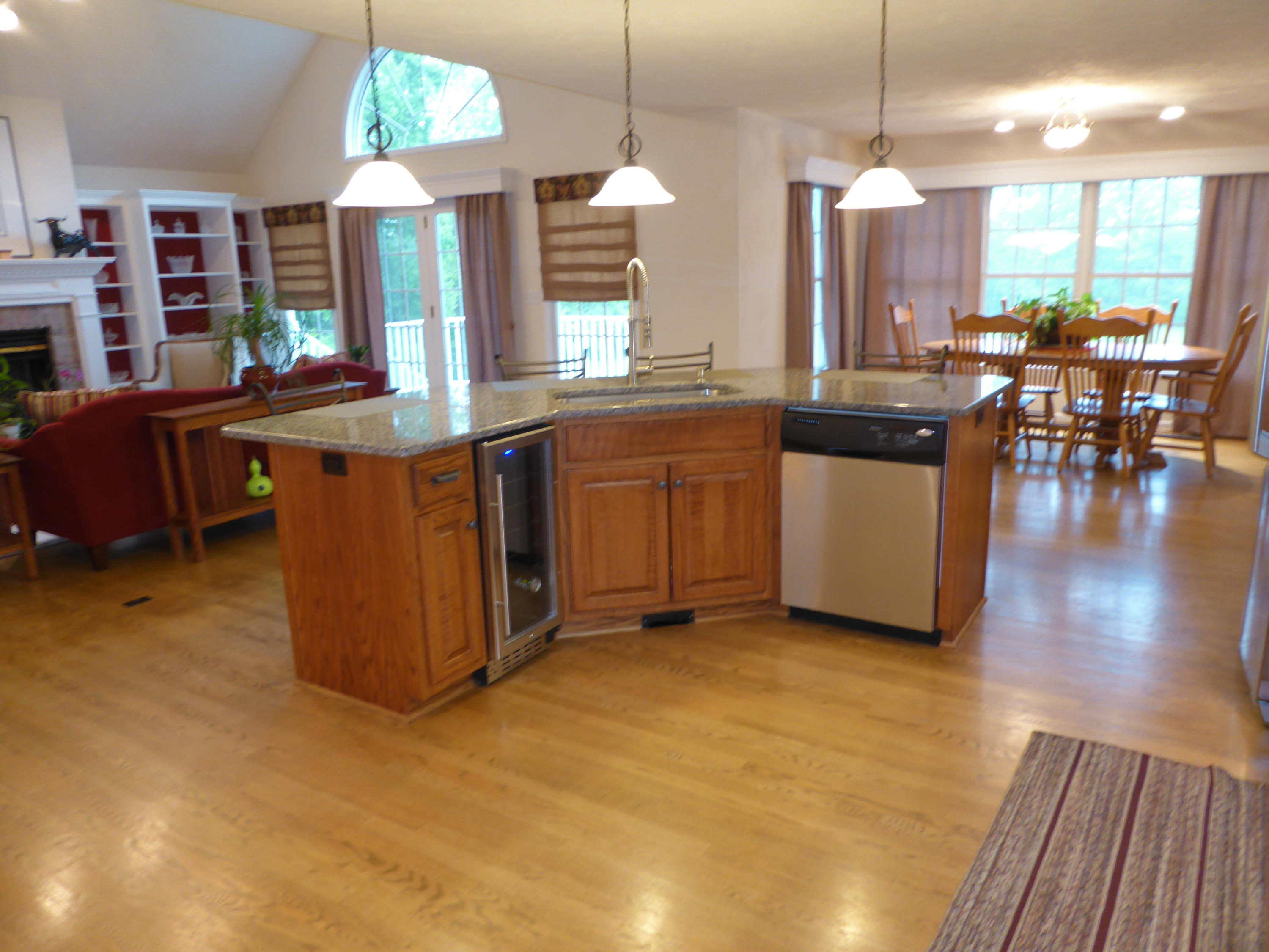 7740 Edwardsville Road Hardy, VA 24101 - Photo 39 of 92 a kitchen with stainless steel appliances granite countertop a stove top oven a dining table and chairs