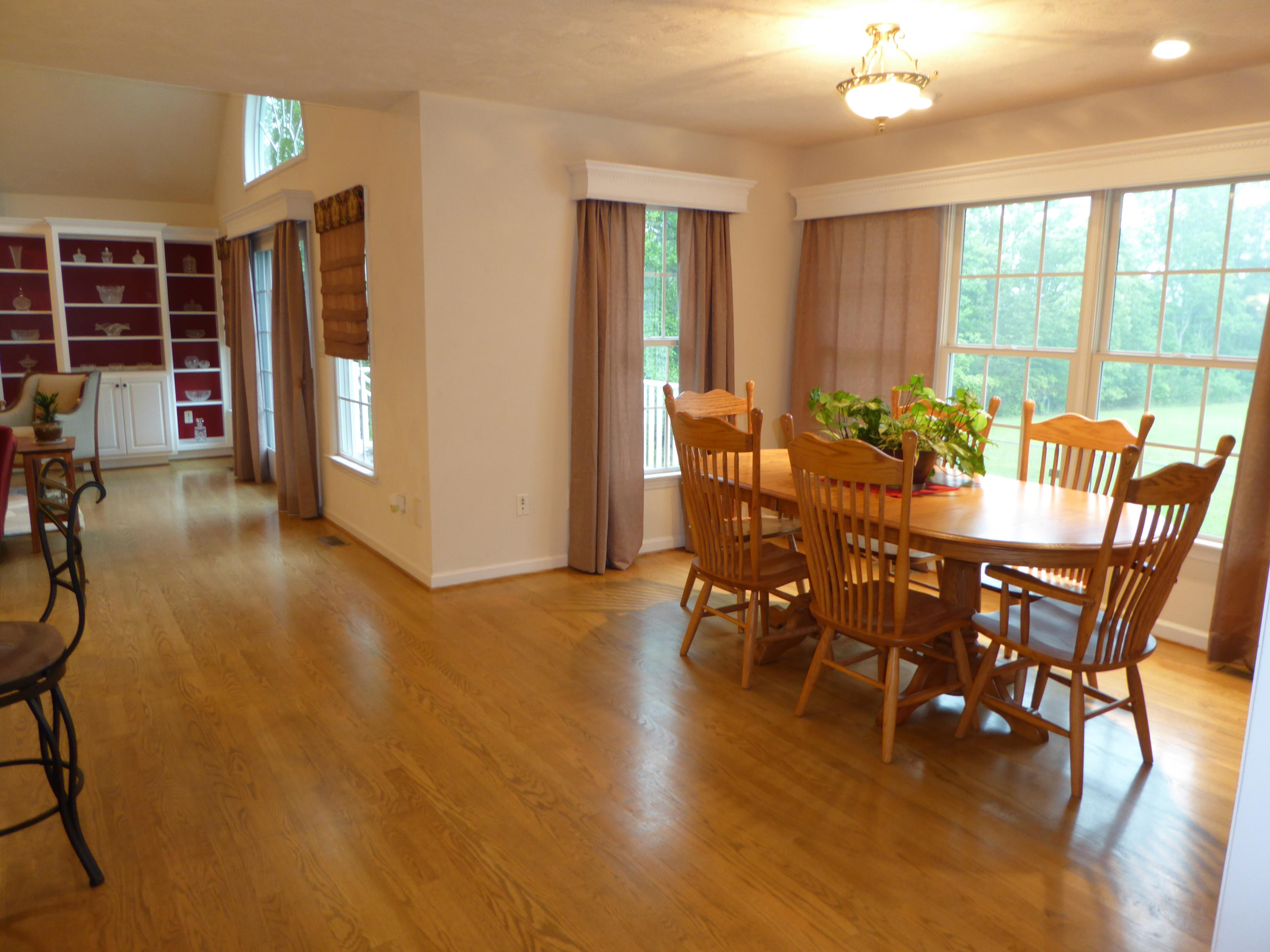 7740 Edwardsville Road Hardy, VA 24101 - Photo 45 of 92 a view of a dining room with furniture window and wooden floor