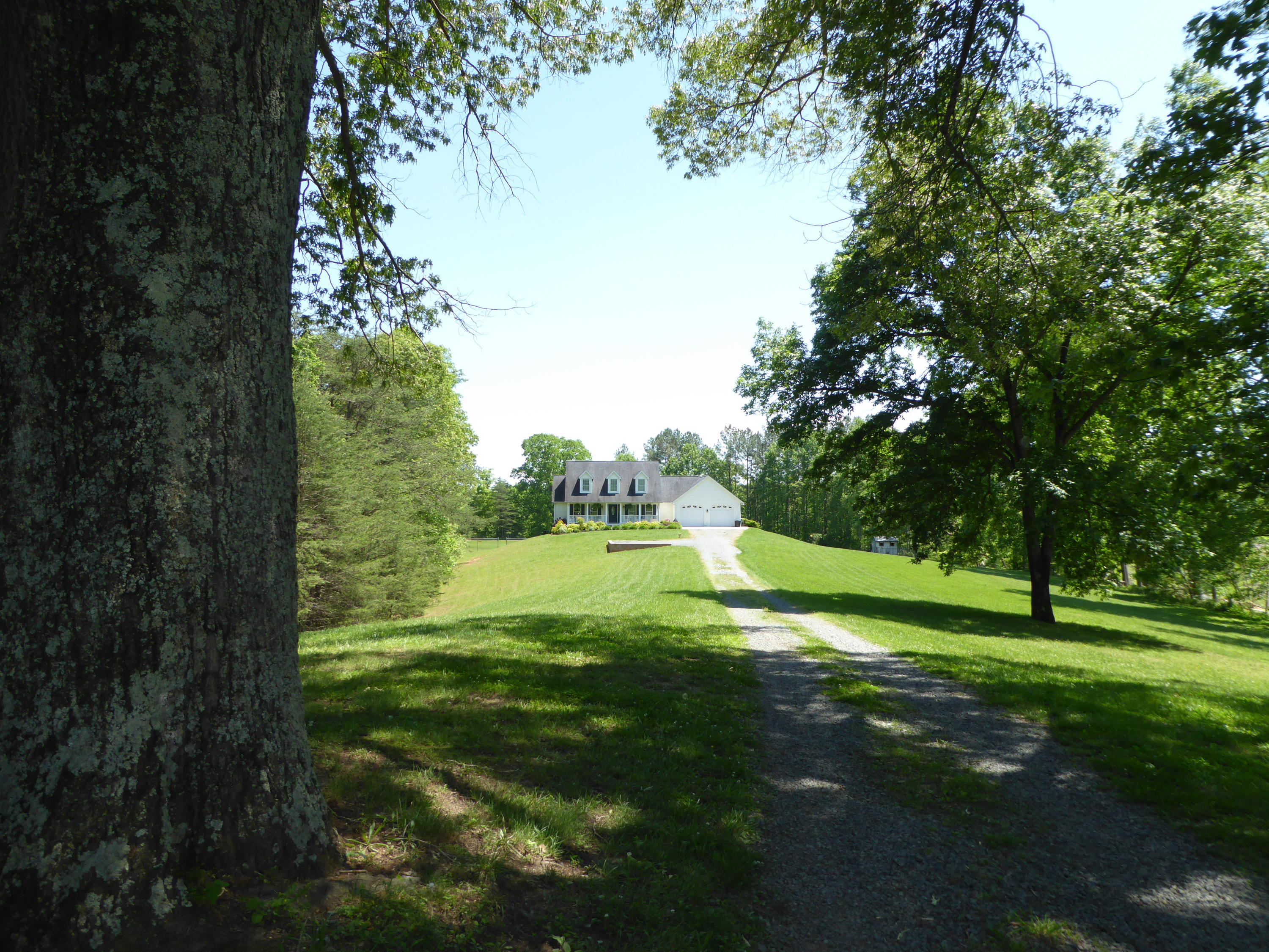 7740 Edwardsville Road Hardy, VA 24101 - Photo 88 of 92 a view of a golf course with a lake view