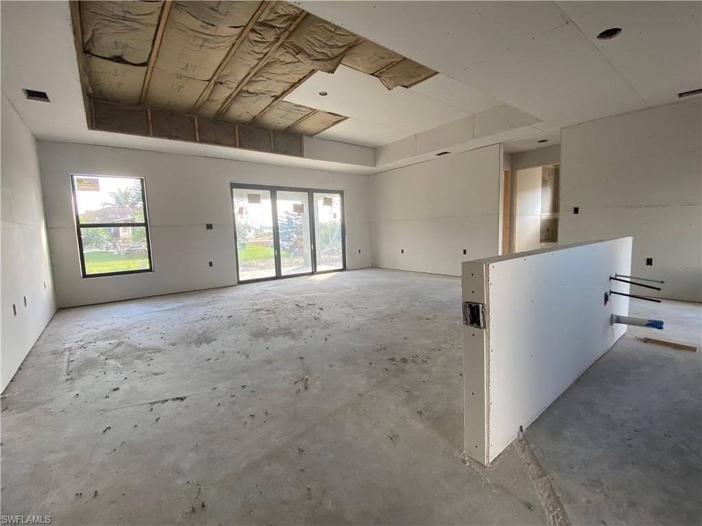 a view of livingroom with furniture and windows