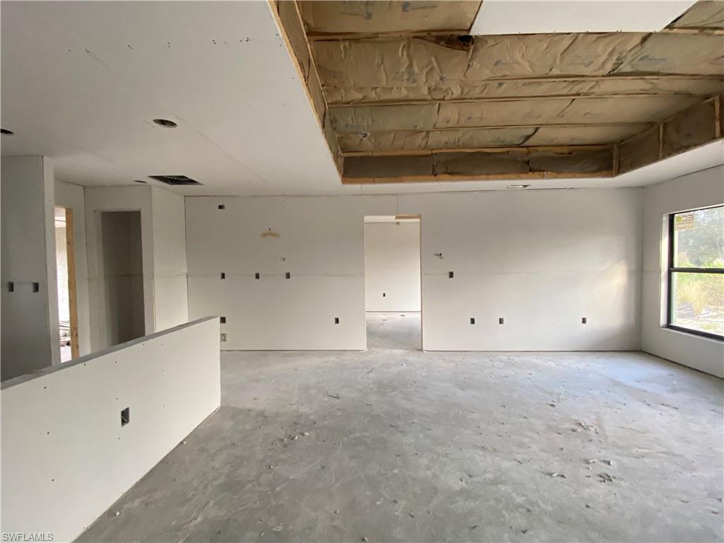 3317 7th Street Southwest Lehigh Acres, FL 33976 - Photo 8 of 23 a view of an empty room