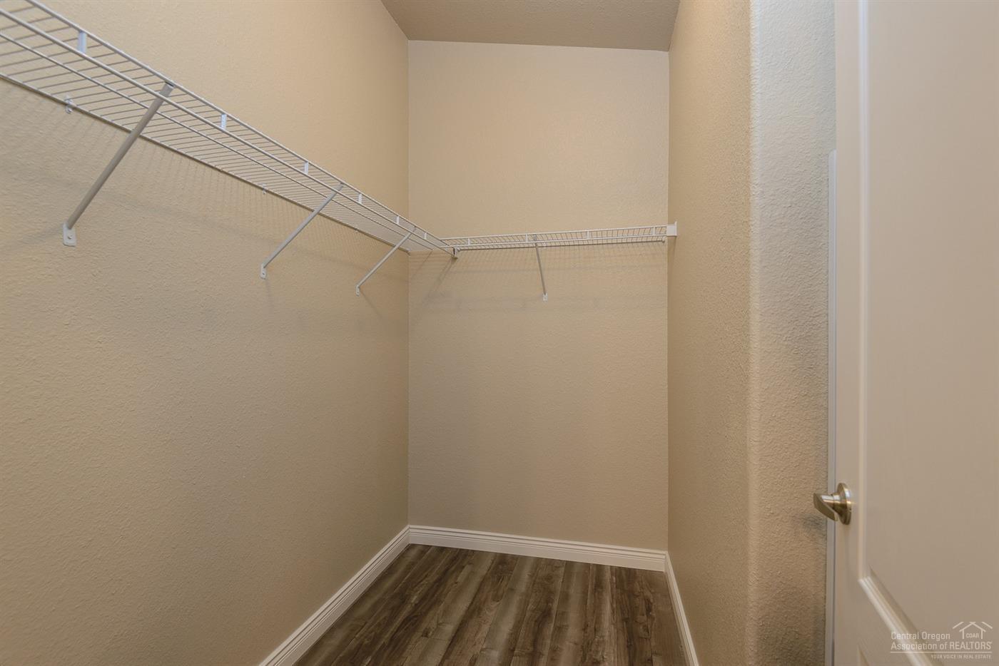 17237 Jacinto Road Bend, OR 97707 - Photo 18 of 20 a view of a room with racks on the wall