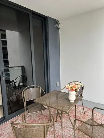 a view of a dining table chair and table