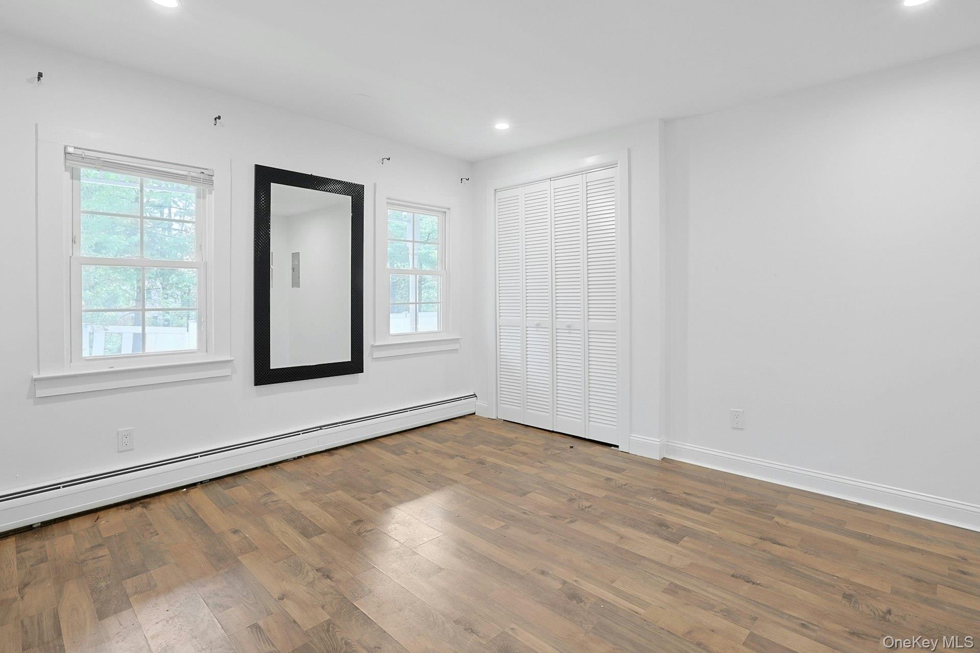200 Bardonia Road Bardonia, NY 10954 - Photo 22 of 34 wooden floor in an empty room with a window