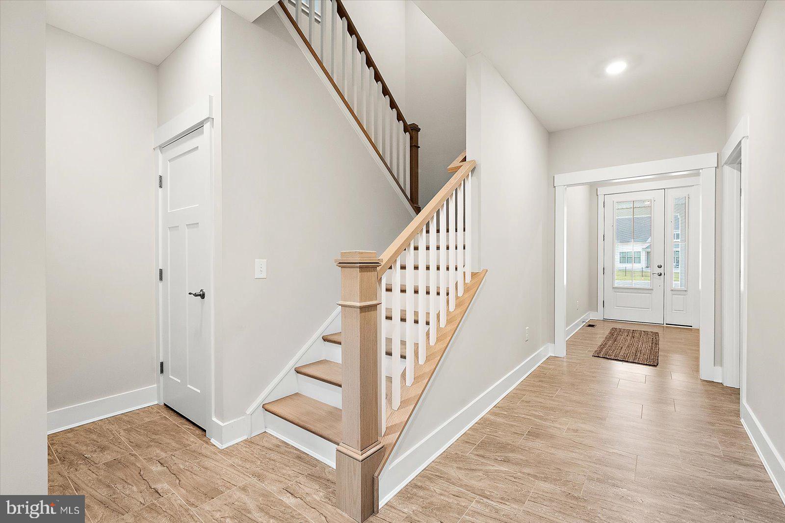 32209 Longleaf Road Frankford, DE 19945 - Photo 55 of 106 Wide Staircase Leads To Upstairs Guest Quarters