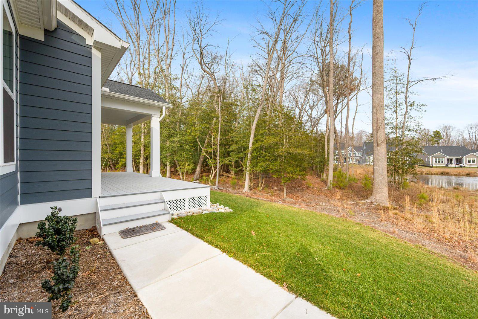 32209 Longleaf Road Frankford, DE 19945 - Photo 64 of 106 Sidewalk Off Of Back Deck