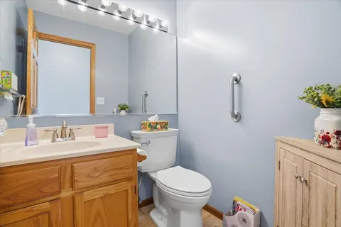 a view of walk in closet with clothes