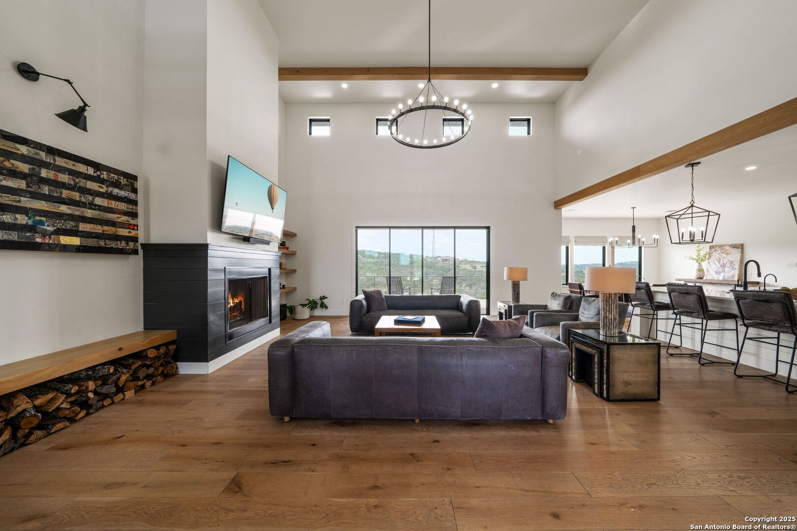 384 Blue Diamond Boerne, TX 78006 - Photo 10 of 51 a living room with fireplace furniture and a large window