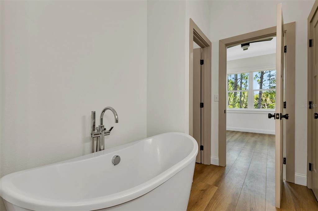 2444 Jacobs Street Port Charlotte, FL 33953 - Photo 29 of 52 a bathroom with a bathtub and a sink