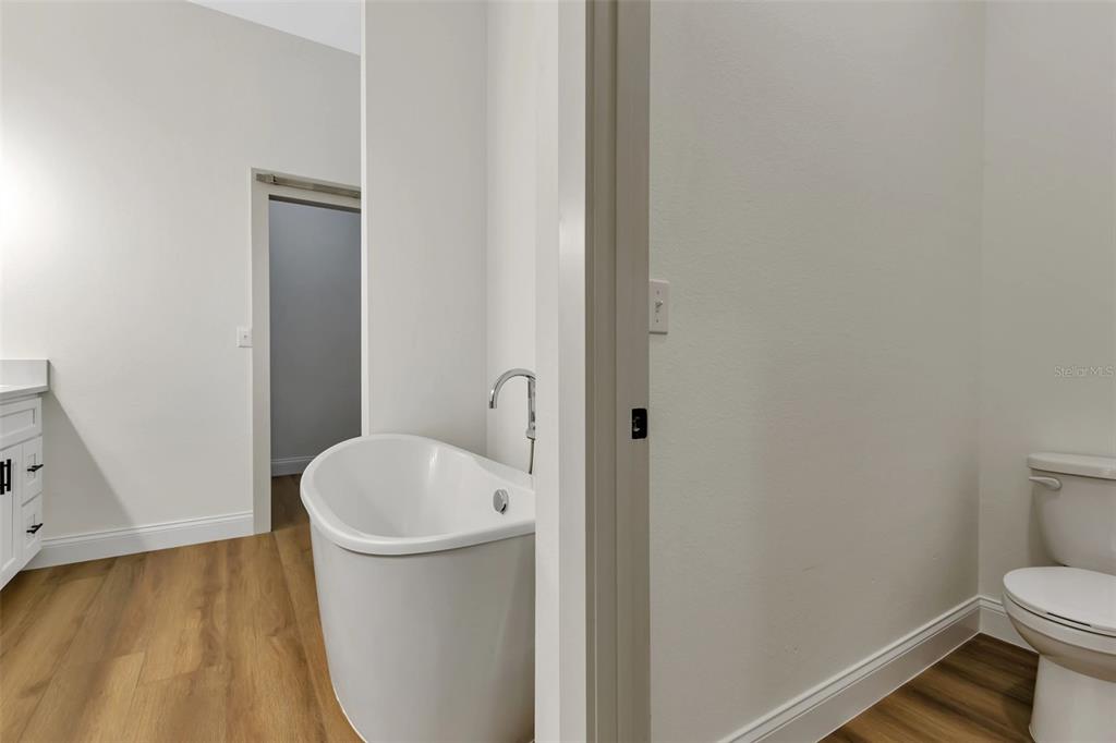 2444 Jacobs Street Port Charlotte, FL 33953 - Photo 31 of 52 a bathroom with a sink and a toilet