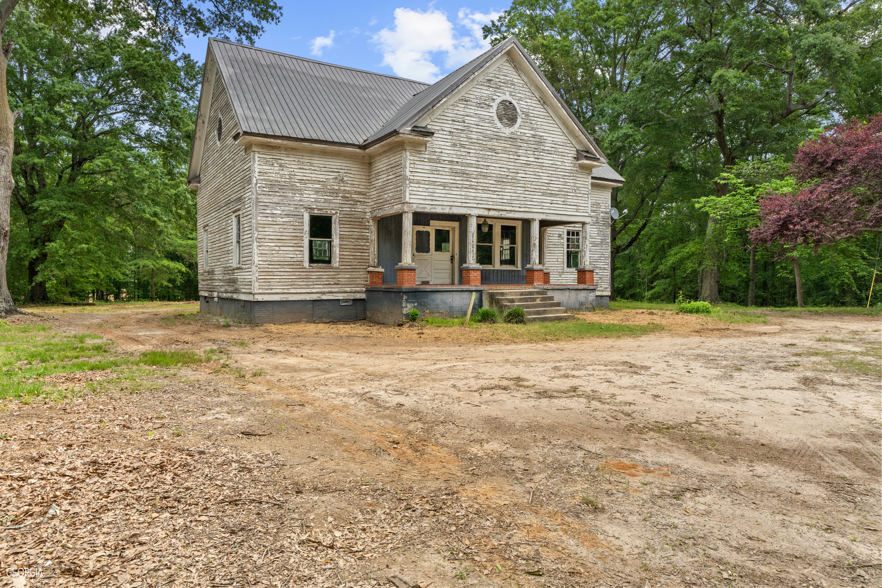 3231 Prospect Road Rutledge, GA 30663 - Photo 1 of 1 a front view of a house with yard