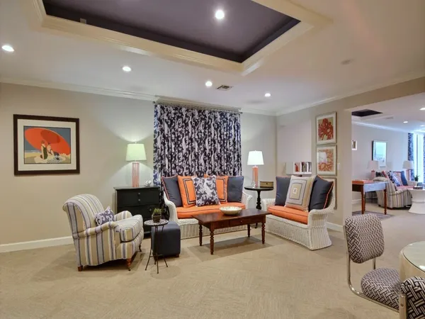 a living room with furniture and a table