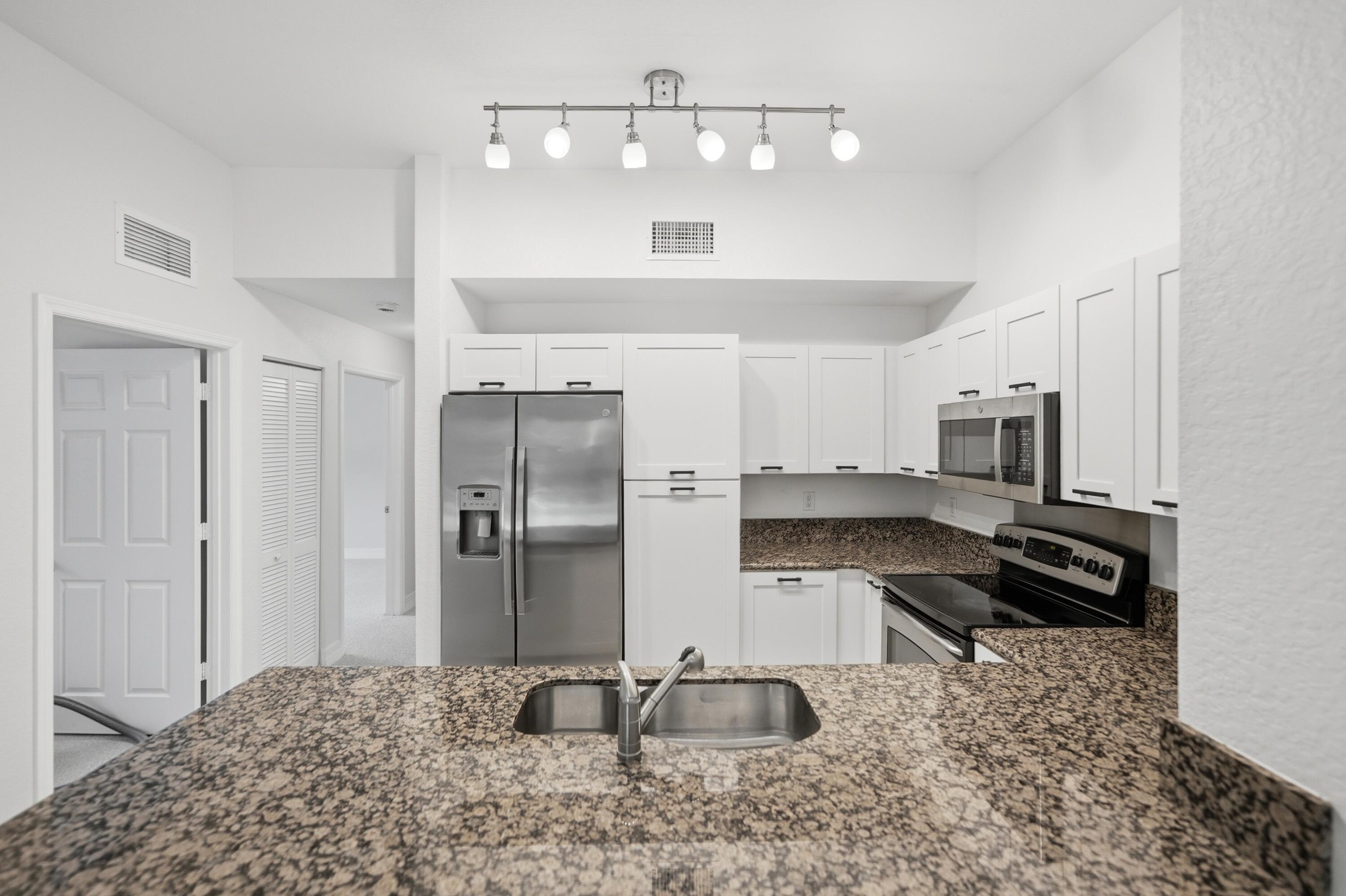 58 Southeast Palermo, Unit 104 Stuart, FL 34994 - Photo 6 of 37 35-print-58-se-palermo-ct-104