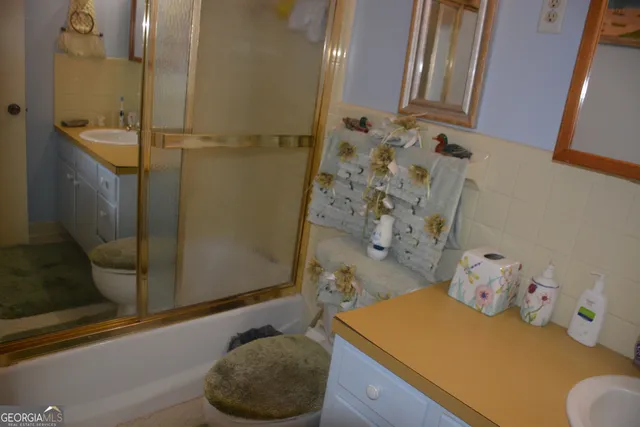 a bathroom with a sink and a shower