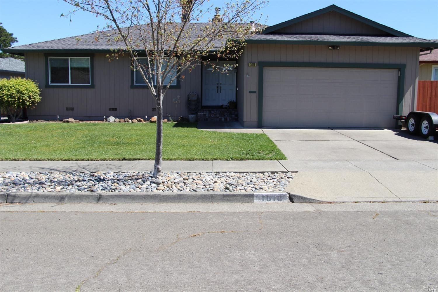 1618 Dudley Place Santa Rosa, CA 95401 - Photo 1 of 1 a front view of a house with a garden