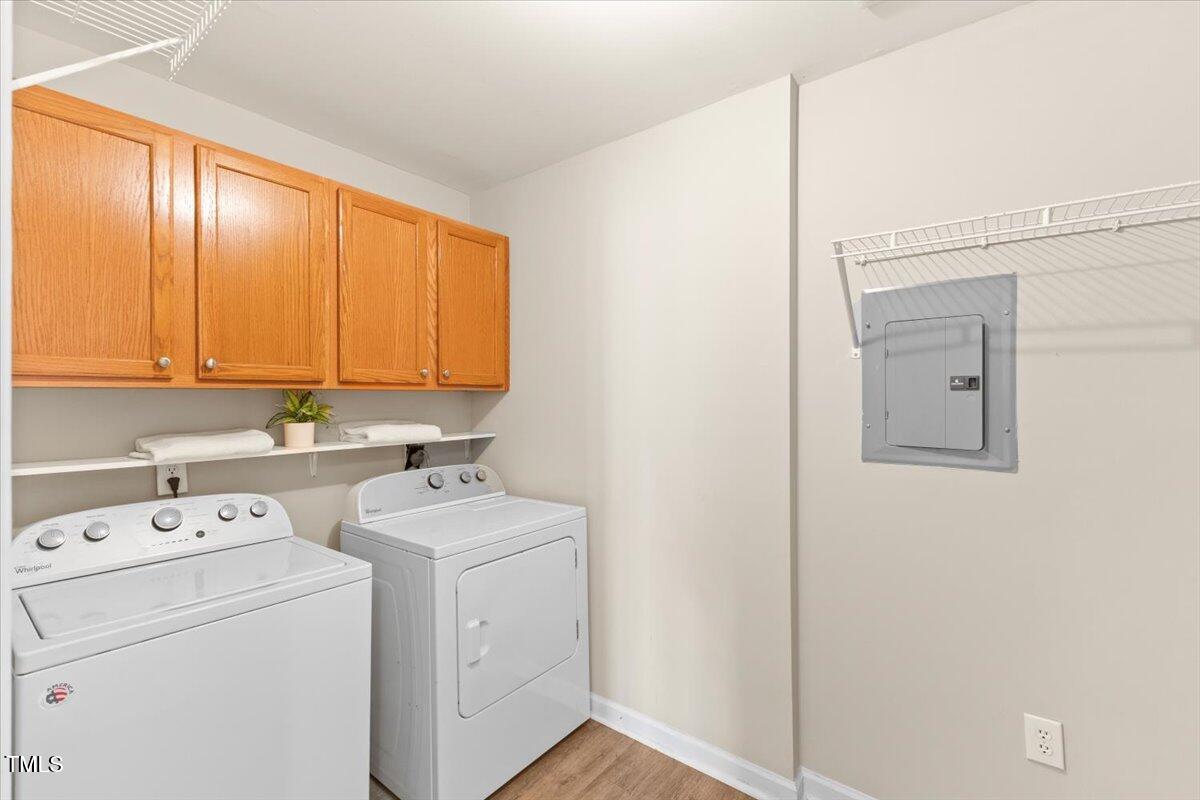 723 Renshaw Court Cary, NC 27518 - Photo 11 of 34 a view of utility room with washer and dryer
