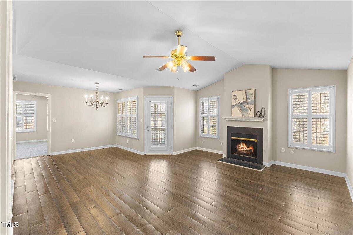 723 Renshaw Court Cary, NC 27518 - Photo 12 of 34 a view of empty room with wooden floor and fan
