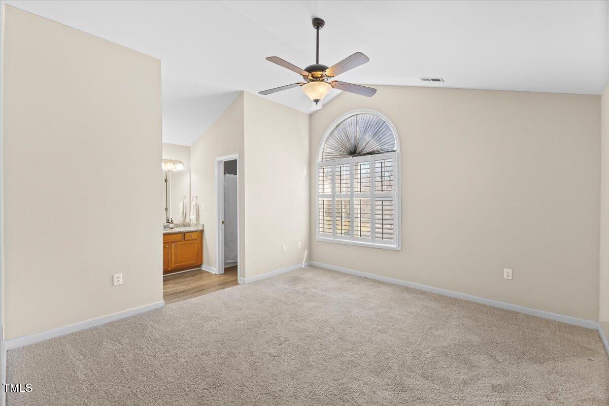 723 Renshaw Court Cary, NC 27518 - Photo 5 of 34 a view of a livingroom with a ceiling fan and window