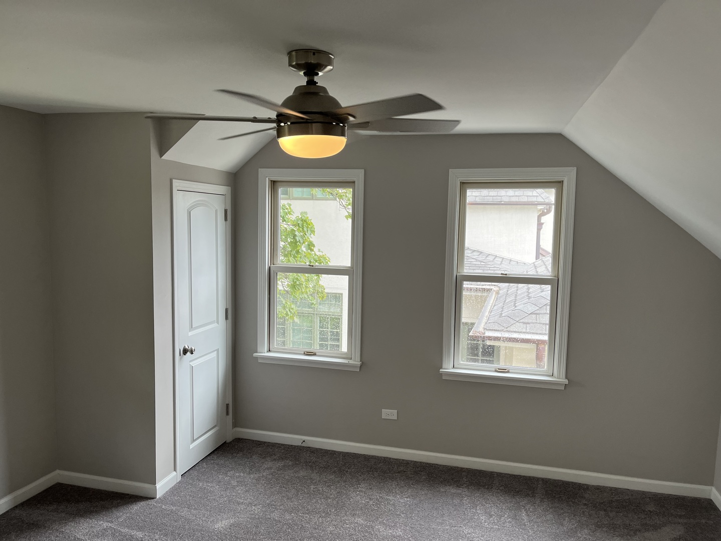 293 Scott Street Lake Forest, IL 60045 - Photo 11 of 30 an empty room with windows and a chandelier fan