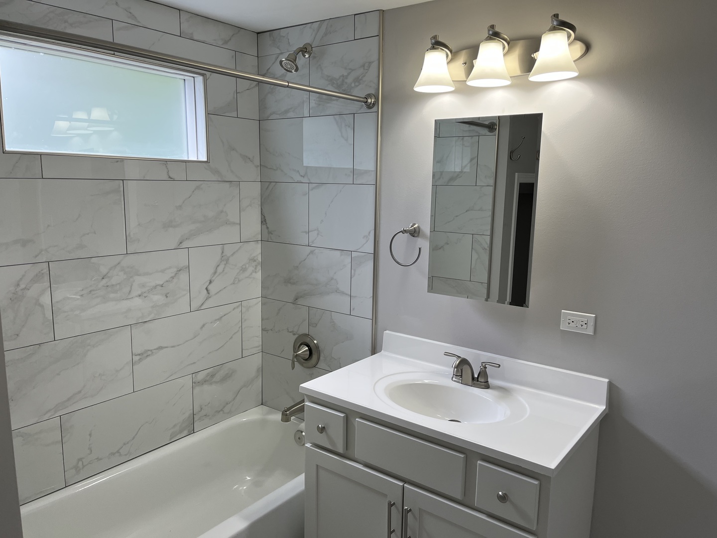 293 Scott Street Lake Forest, IL 60045 - Photo 13 of 30 a bathroom with a sink and a mirror