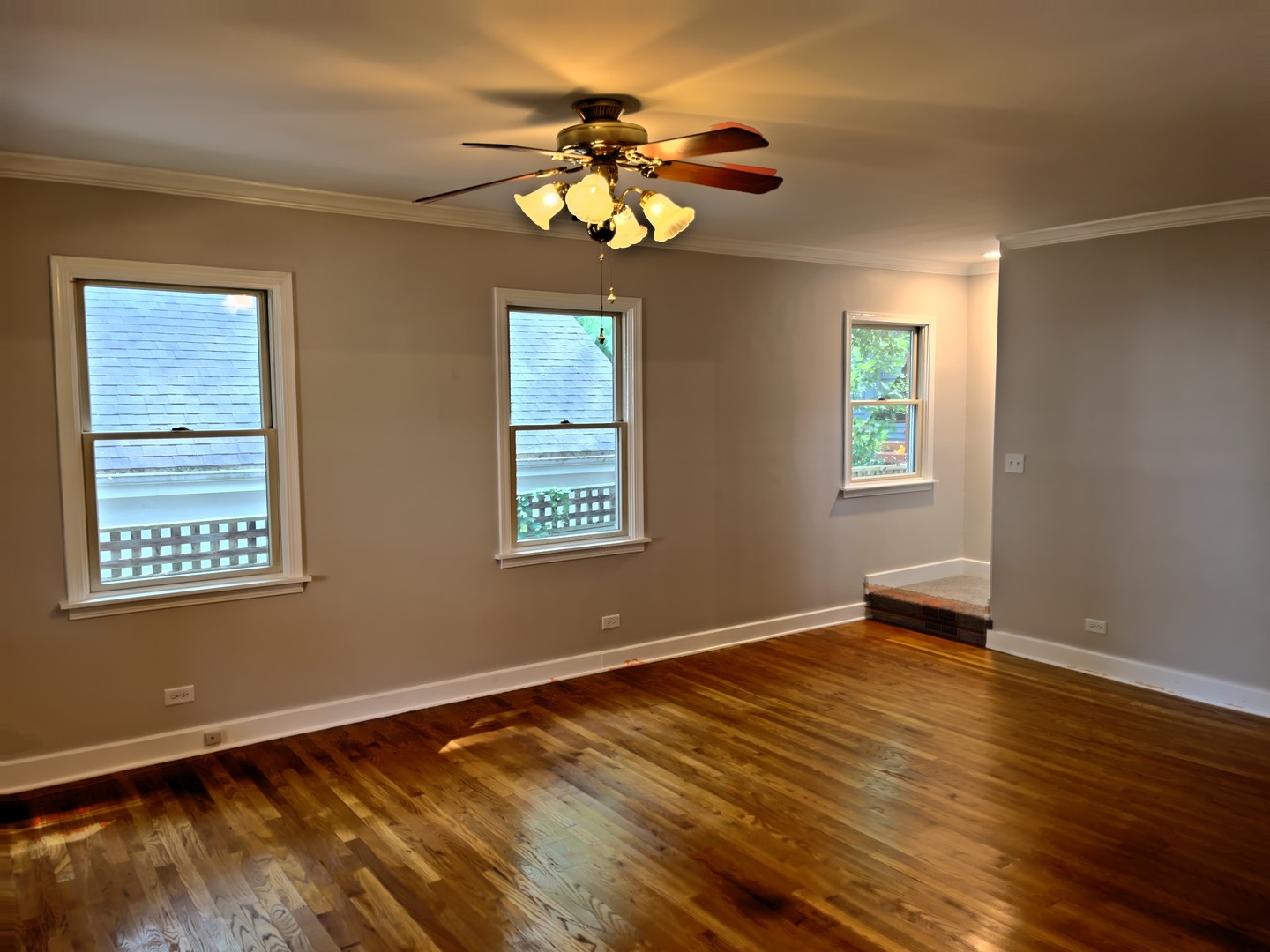 293 Scott Street Lake Forest, IL 60045 - Photo 15 of 30 a view of an empty room with a window and wooden floor