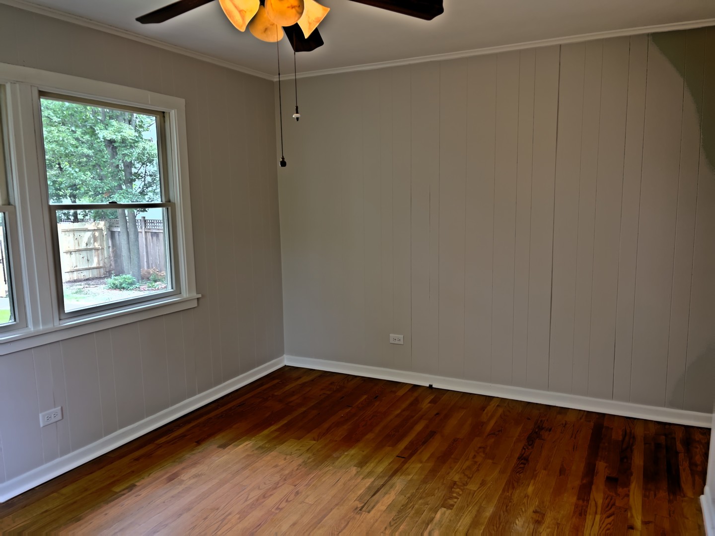 293 Scott Street Lake Forest, IL 60045 - Photo 19 of 30 a view of an empty room with wooden floor and a window