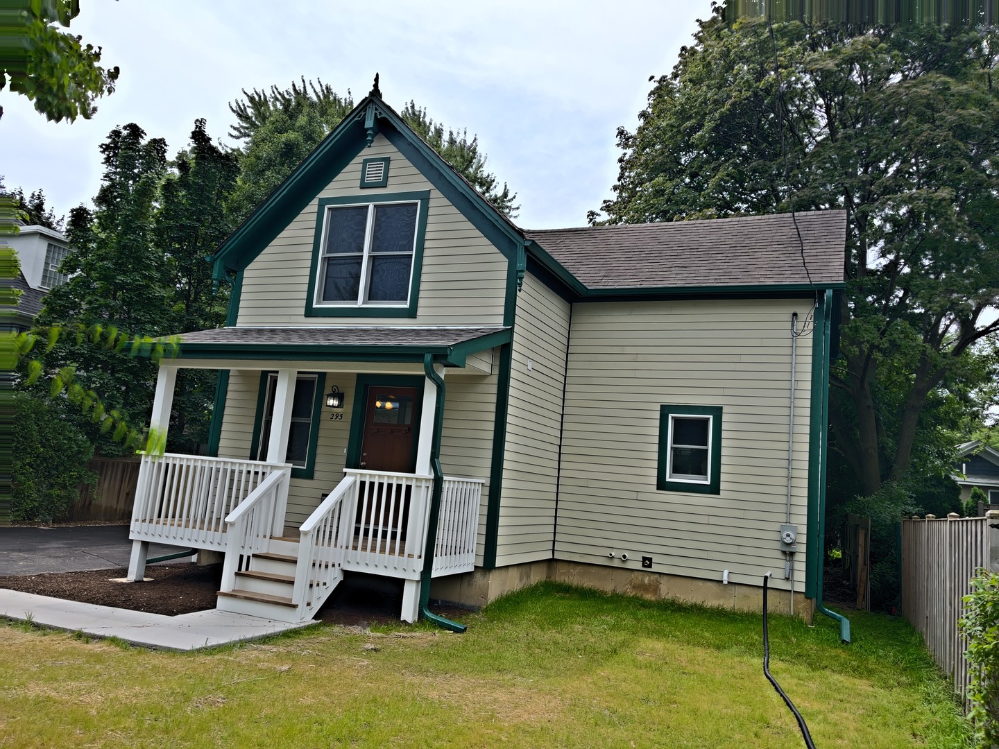 293 Scott Street Lake Forest, IL 60045 - Photo 2 of 30 a view of a house with a yard deck and a garden