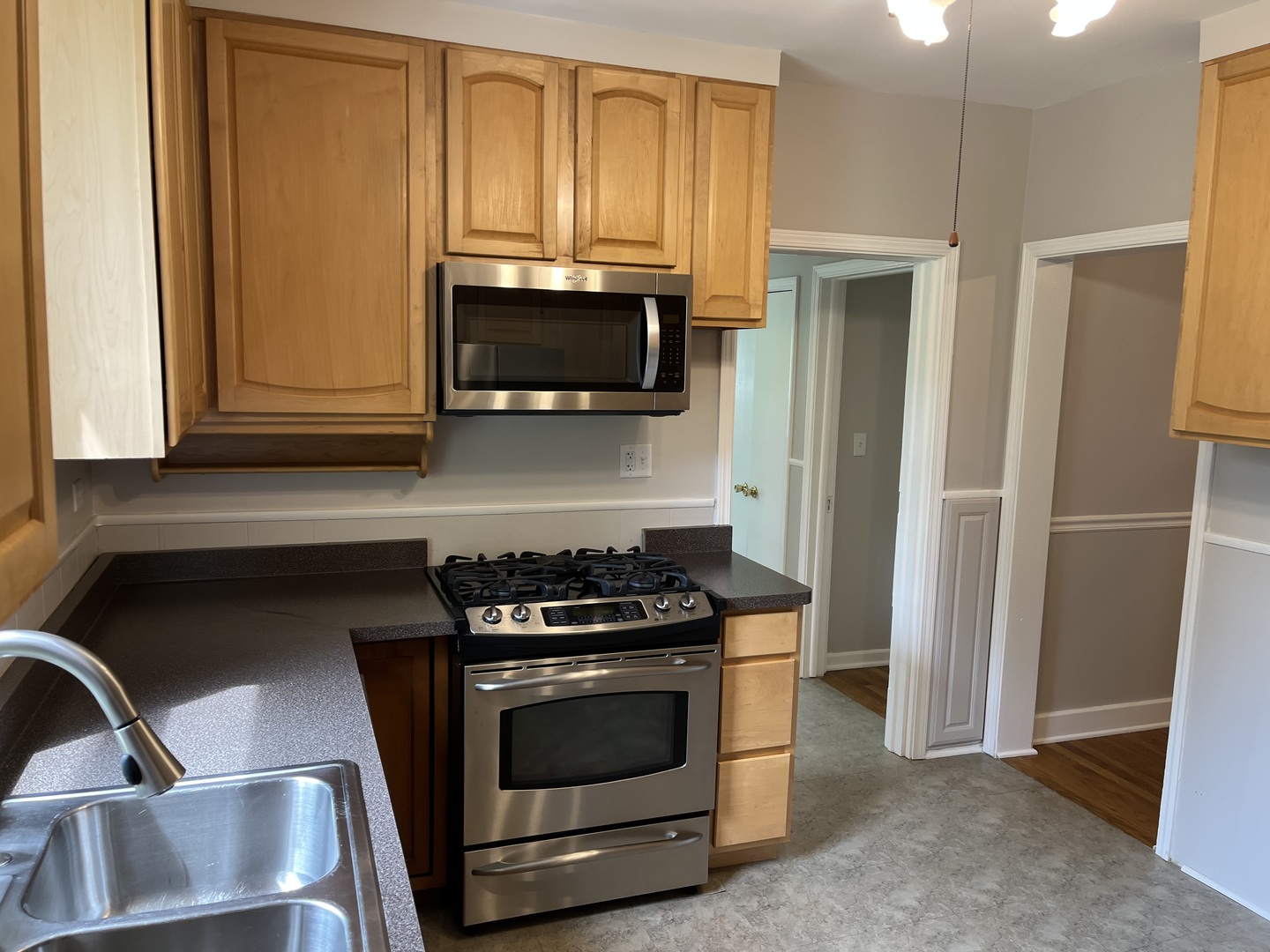 293 Scott Street Lake Forest, IL 60045 - Photo 22 of 30 a kitchen with granite countertop cabinets stainless steel appliances and a window