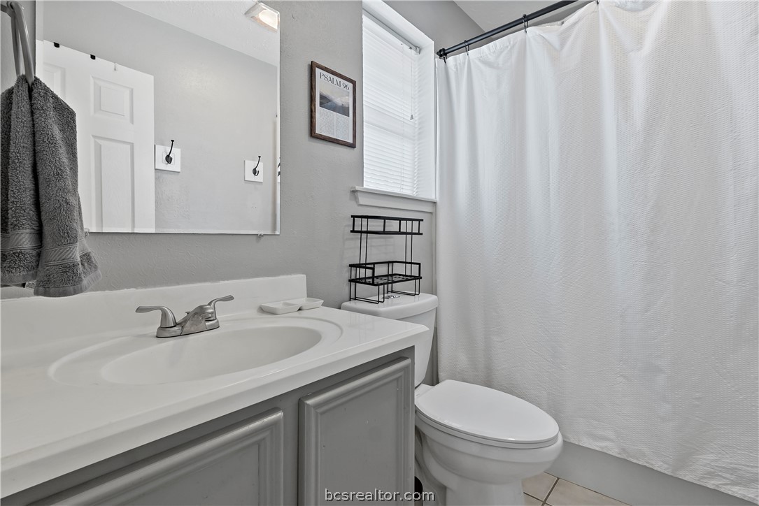 804 East 32nd Street Bryan, TX 77803 - Photo 17 of 22 a bathroom with a sink toilet and shower