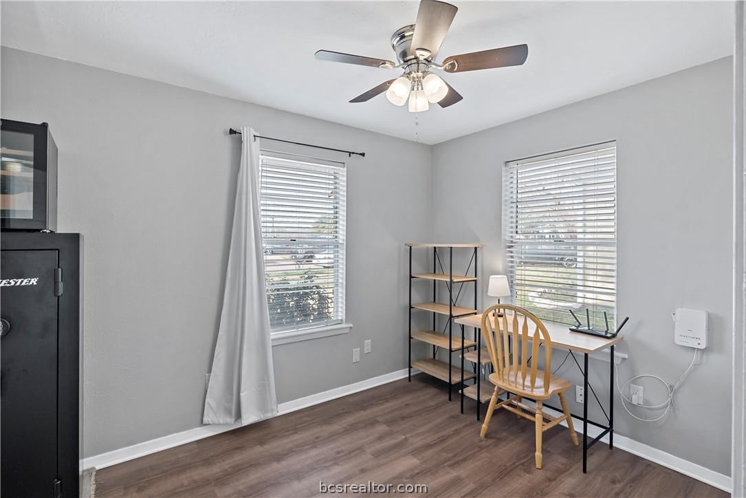 804 East 32nd Street Bryan, TX 77803 - Photo 20 of 22 a view of a workspace with furniture and a window