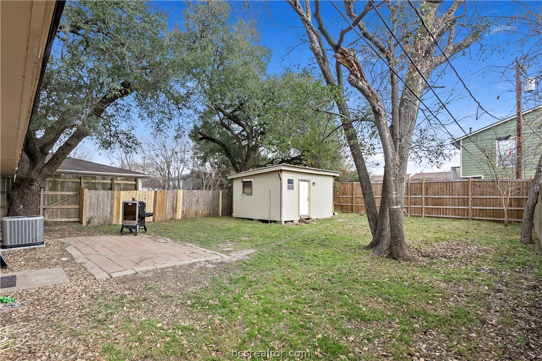 804 East 32nd Street Bryan, TX 77803 - Photo 21 of 22 a house with trees in front of it