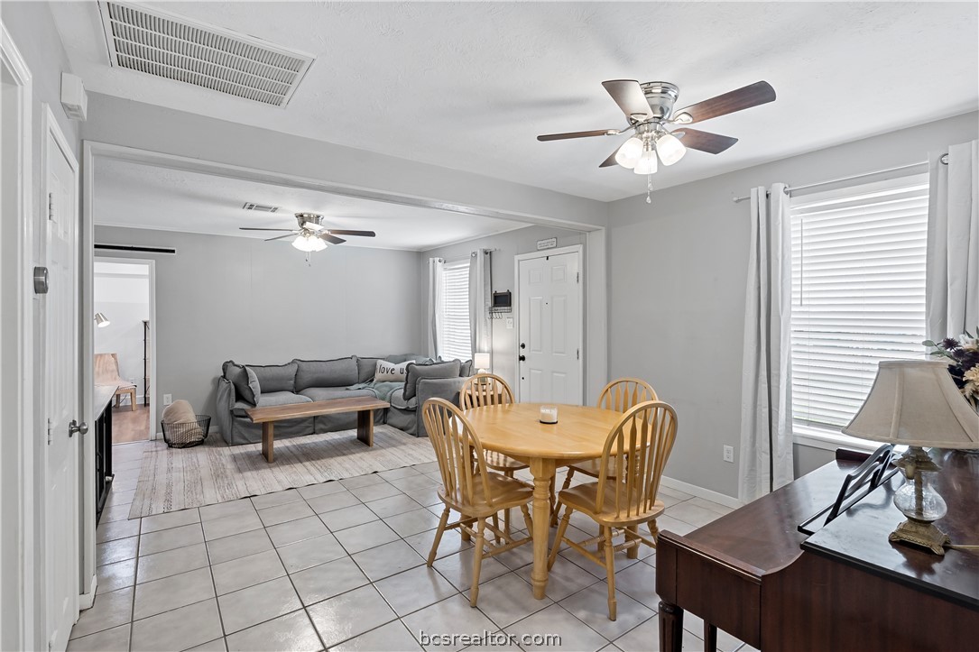 804 East 32nd Street Bryan, TX 77803 - Photo 7 of 22 a dining room with furniture and wooden floor
