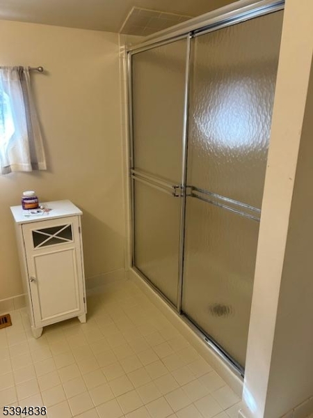 17 Crestmont Road Bedminster, NJ 07921 - Photo 10 of 20 a bathroom with a shower and a sink