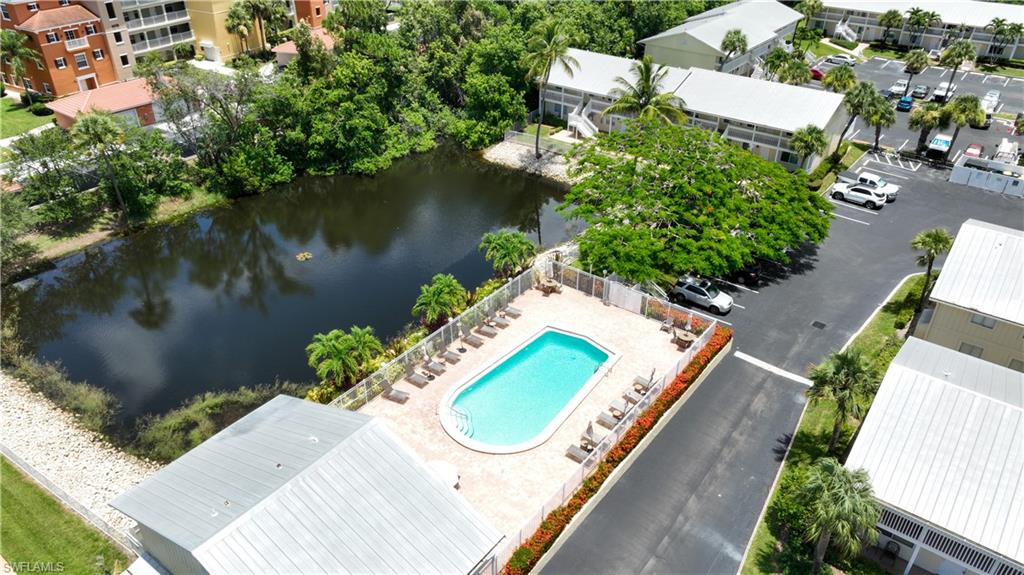 4621 Bayshore Drive, Unit Q4 Naples, FL 34112 - Photo 12 of 12 an aerial view of a house with a lake view