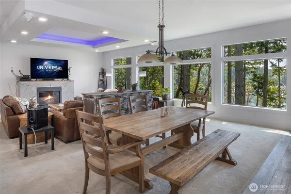 a view of a dining room with furniture window and outside view