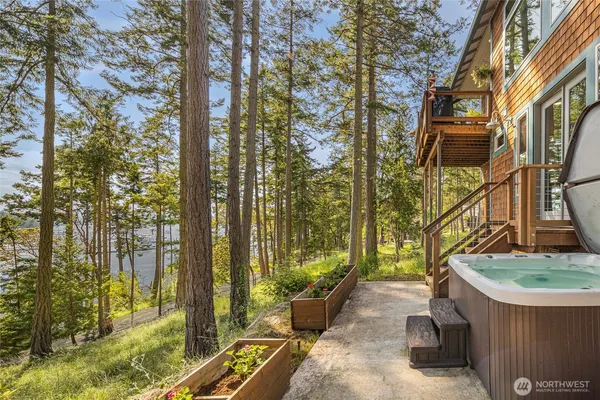 a backyard of a house with outdoor seating