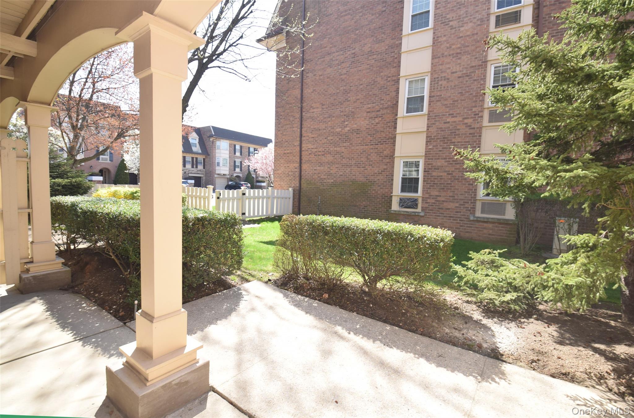 206-14 Emily Road, Unit 42L Queens, NY 11360 - Photo 13 of 14 a view of a back yard