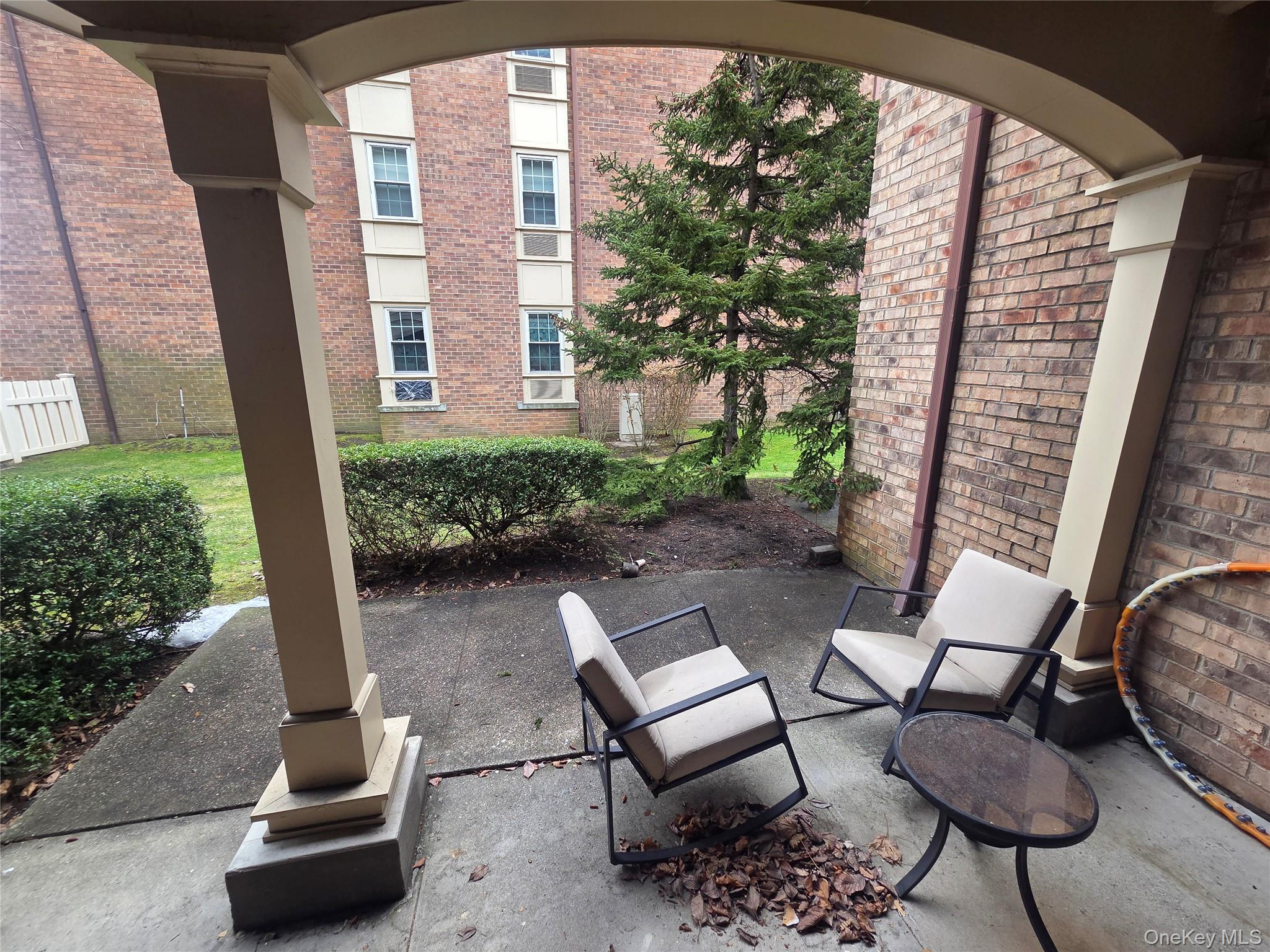 206-14 Emily Road, Unit 42L Queens, NY 11360 - Photo 9 of 9 a view of backyard patio and outdoor seating