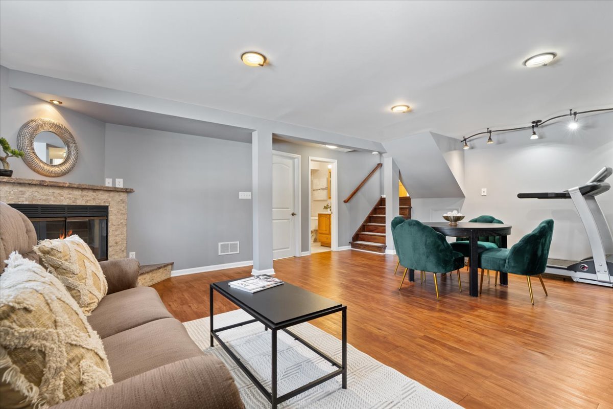 320 Beverly Drive Wilmette, IL 60091 - Photo 28 of 38 a living room with furniture and a wooden floor