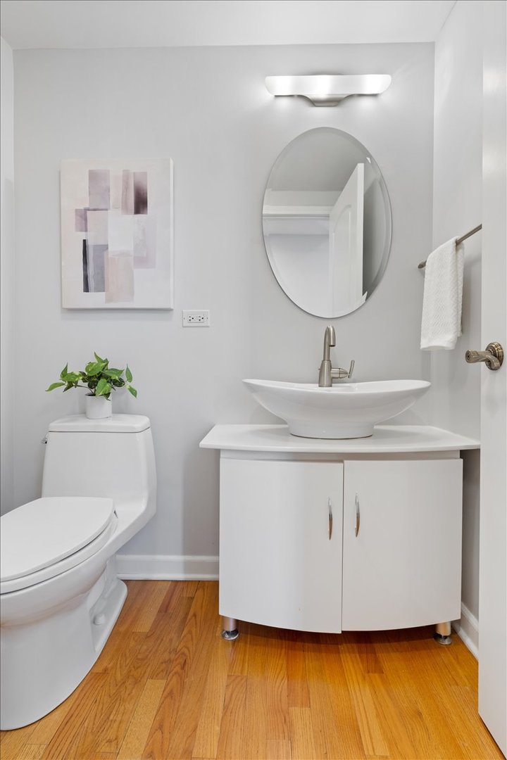 320 Beverly Drive Wilmette, IL 60091 - Photo 32 of 38 a bathroom with a sink mirror and toilet