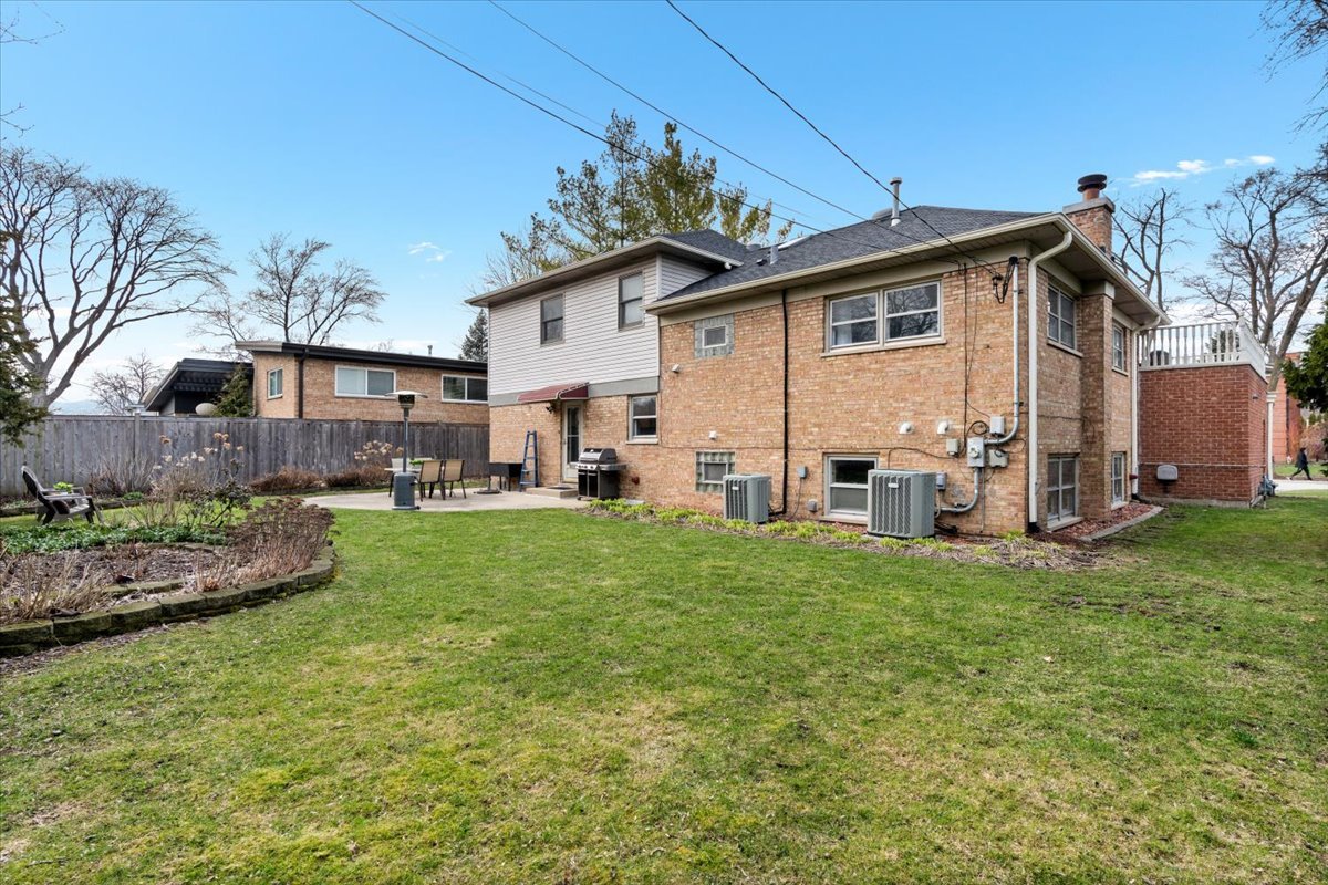 320 Beverly Drive Wilmette, IL 60091 - Photo 33 of 38 a view of a house with backyard and sitting area