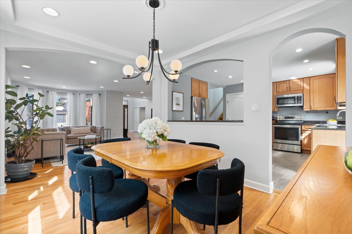 320 Beverly Drive Wilmette, IL 60091 - Photo 7 of 38 a view of a dining room with furniture and a chandelier