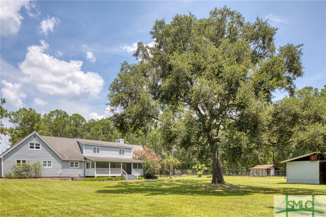 45 Perry Road Bloomingdale, GA 31302 - Photo 2 of 44 Gorgeous tree in the back pasture