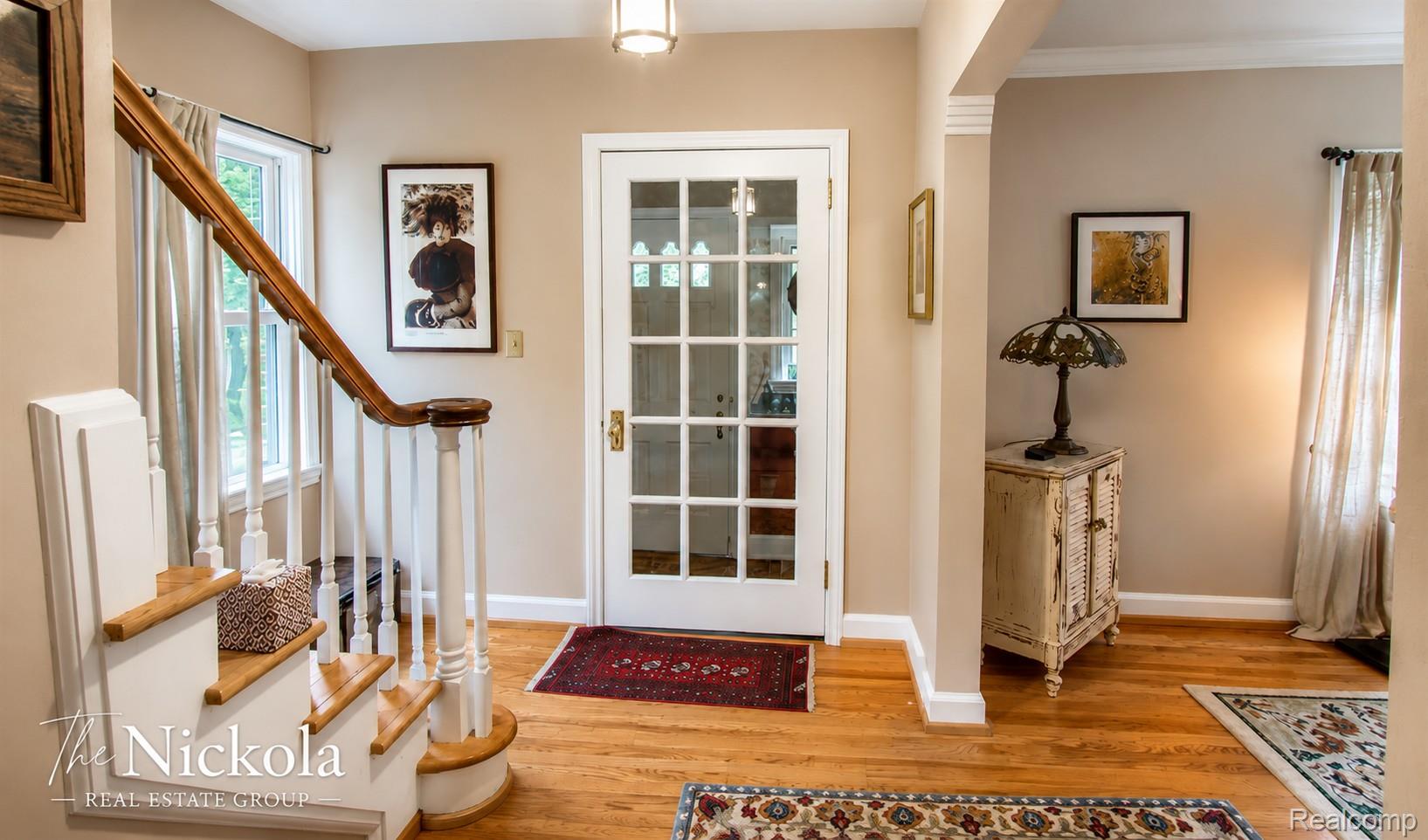 515 Barrington Road Detroit, MI 48215 - Photo 5 of 27 Entrance foyer with stairs and light wood-style flooring