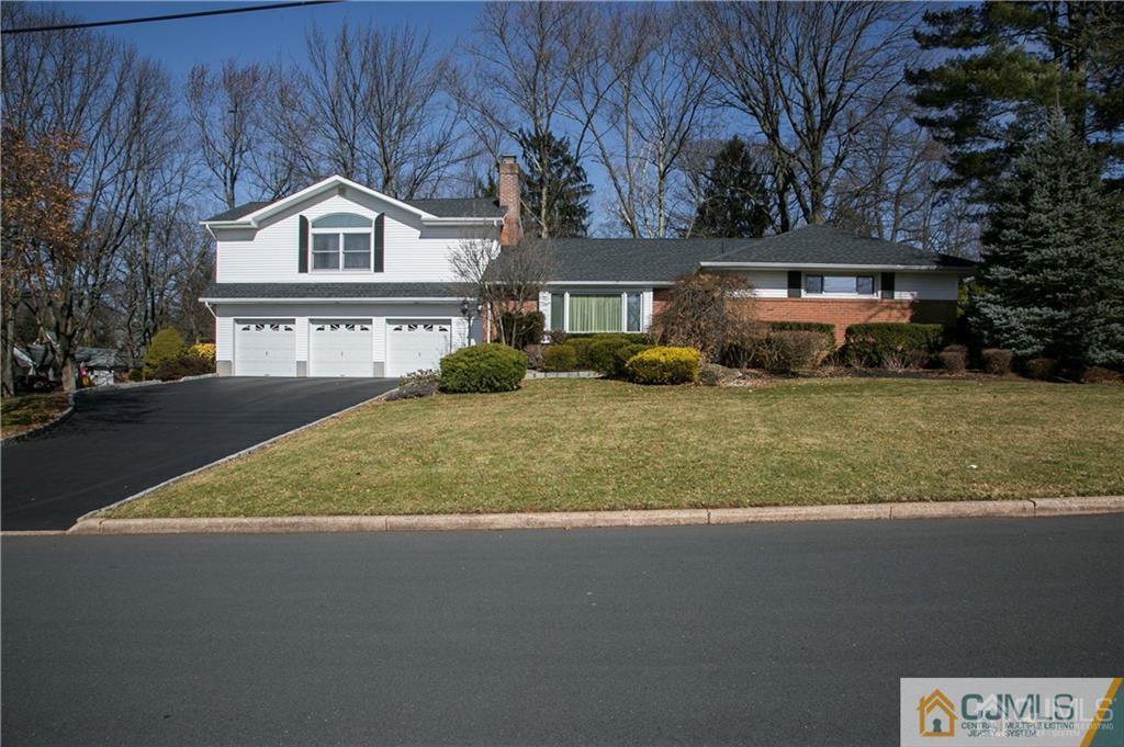 1 Moraine Road Edison, NJ 08820 - Photo 1 of 30 a front view of a house with a yard