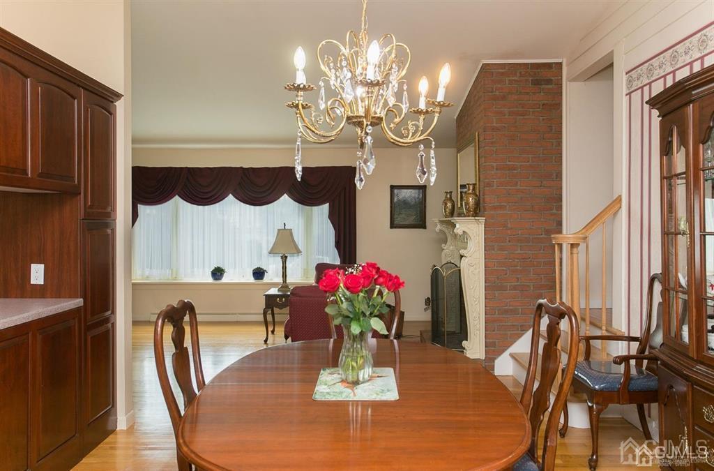 1 Moraine Road Edison, NJ 08820 - Photo 12 of 30 a view of a dining room with furniture and chandelier